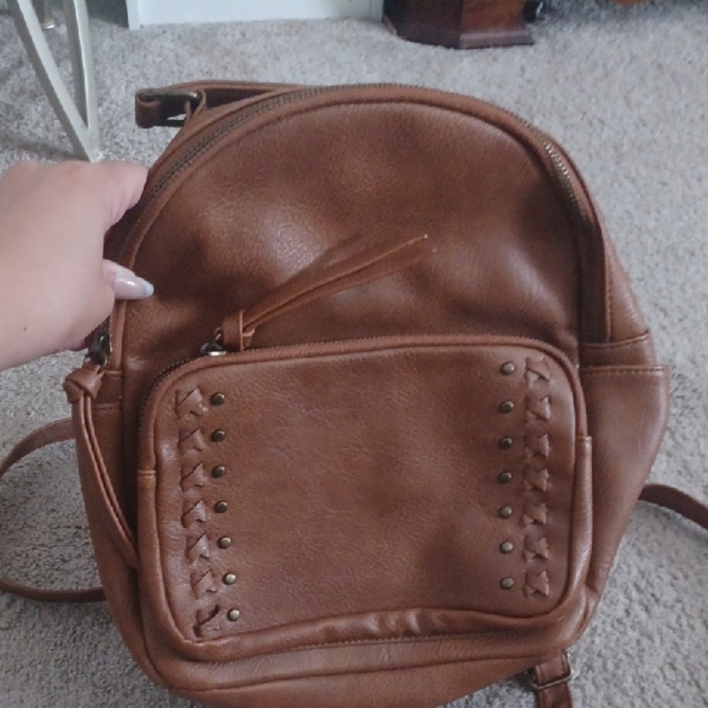 Brown Leather Backpack with Braided Detailing
